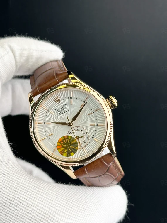 Rolex Cellini beyaz kadranlı, rose gold kasa, kahverengi deri kayışlı otomatik erkek saat