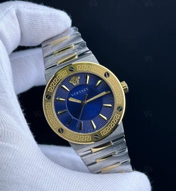 Versace Icon Greca tarzı kadın saat, mavi kadranlı, gold bezel ve çelik bilezikli pilli model