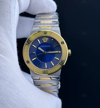 Versace Icon Greca tarzı kadın saat, mavi kadranlı, gold bezel ve çelik bilezikli pilli model