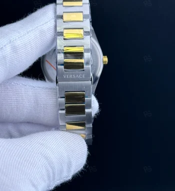 Versace V-Race tarzı kadın saat, yeşil kadranlı, gold bezel ve çelik bilezikli pilli model