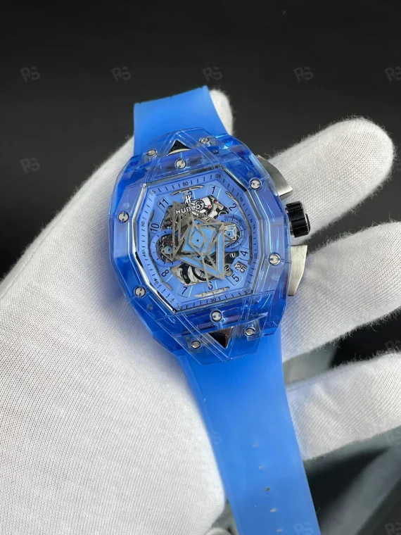 Hublot Big Bang Sang Bleu Sapphire Blue Ice, kobalt mavi şeffaf kasalı, skeleton kadranlı, otomatik mekanizmalı, mavi kayışlı yüksek kalite replika saat