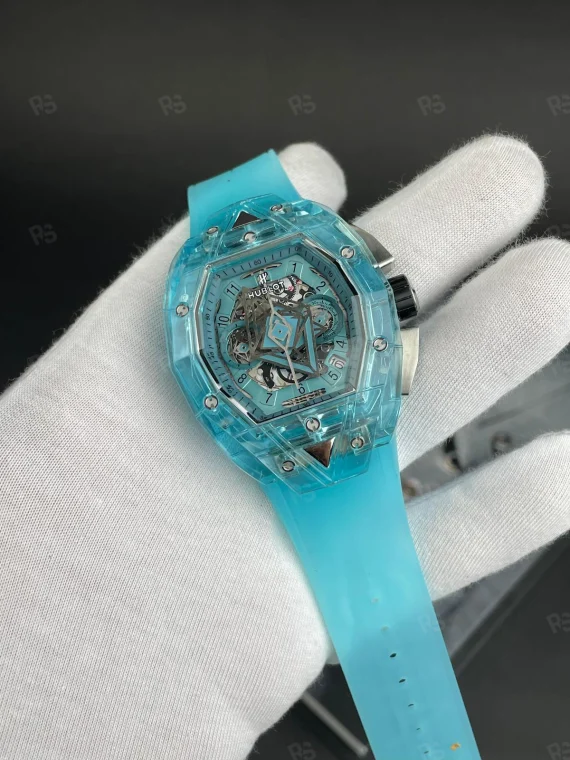 Hublot Big Bang Sang Bleu Sapphire Blue, buz mavisi şeffaf kasalı, skeleton kadranlı, otomatik mekanizmalı, transparan kayışlı koleksiyonluk replika saat