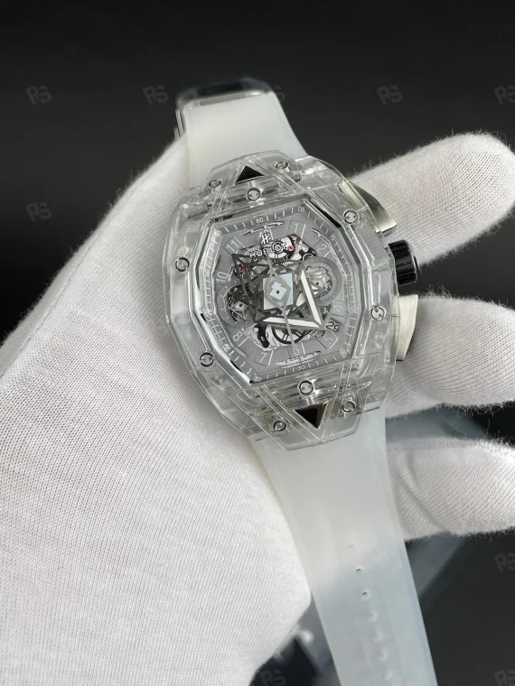 Hublot Big Bang Sang Bleu Sapphire, şeffaf kasalı, skeleton kadranlı, otomatik mekanizmalı, şeffaf kayışlı, sanatsal tasarıma sahip replika saat