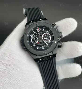 Hublot Big Bang Unico Black Magic, tam siyah kasalı, skeleton kadranlı, quartz mekanizmalı, kauçuk kayışlı, aktif kronograf fonksiyonlu replika saat
