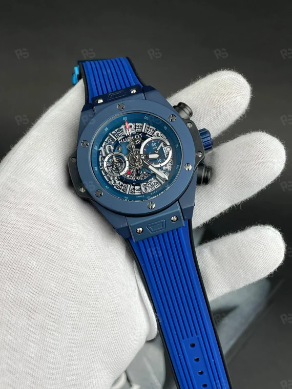 Hublot Big Bang Unico Blue Magic, lacivert kasalı, skeleton kadranlı, quartz mekanizmalı, kauçuk kayışlı, aktif kronograf fonksiyonlu replika saat modeli