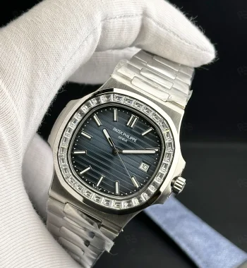 Patek Philippe Nautilus 5711 ince kasa, taşlı bezel, çelik bilezikli otomatik erkek saat