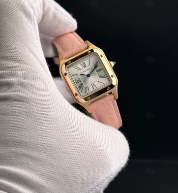 Cartier Santos tarzı kadın saat, altın kasa ve pembe deri kayışlı pilli model
