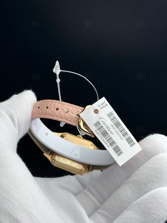 Cartier Santos tarzı kadın saat, altın kasa ve pembe deri kayışlı pilli model