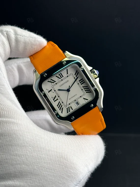 Cartier Santos otomatik erkek saat, beyaz kadranlı ve turuncu deri kayışlı model