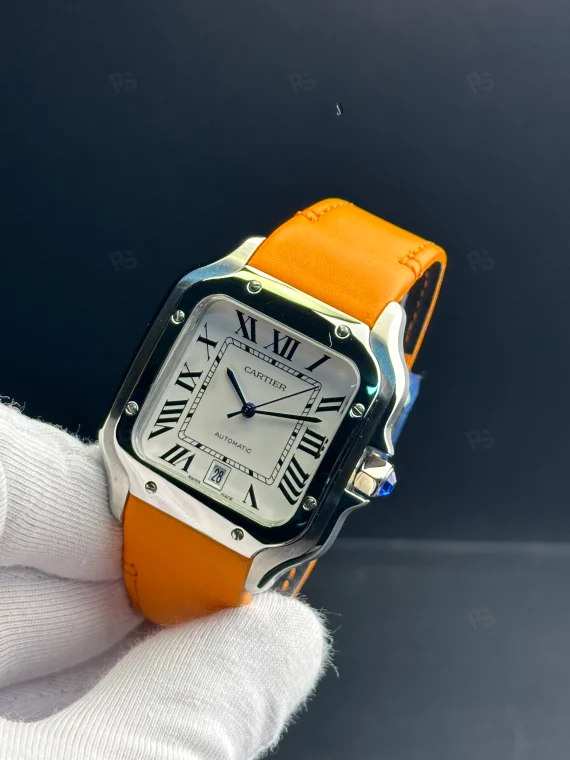 Cartier Santos otomatik erkek saat, beyaz kadranlı ve turuncu deri kayışlı model