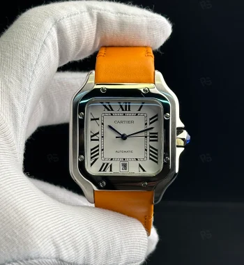 Cartier Santos otomatik erkek saat, beyaz kadranlı ve turuncu deri kayışlı model