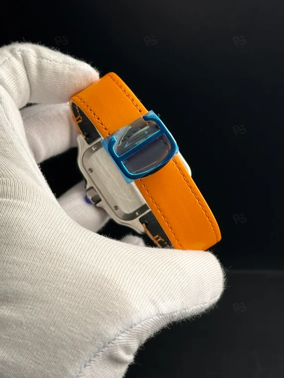 Cartier Santos otomatik erkek saat, beyaz kadranlı ve turuncu deri kayışlı model