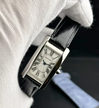 Cartier Tank Américaine kadın saati siyah deri kayışlı ve gümüş kadranlı pilli model