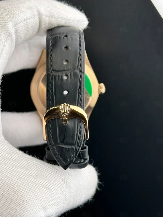 Rolex Cellini siyah kadranlı, rose gold kasa, otomatik mekanizmalı deri kayışlı erkek saat