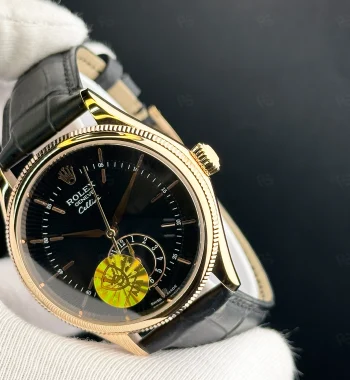 Rolex Cellini siyah kadranlı, rose gold kasa, otomatik mekanizmalı deri kayışlı erkek saat