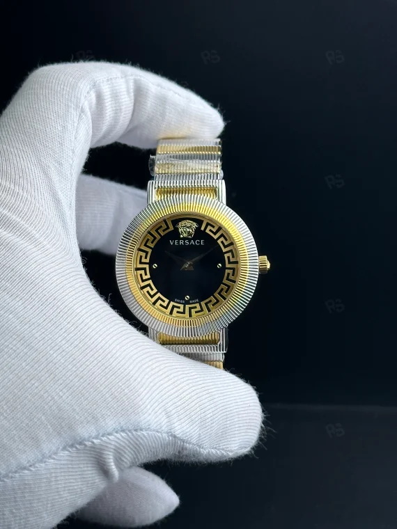 Versace Medusa Icon tarzı kadın saat, siyah kadranlı, gold çerçeveli ve çelik bilezikli pilli model